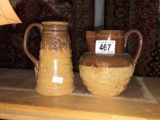 A Royal Doulton stoneware harvest jug and tankard