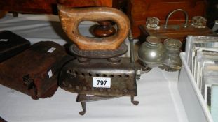 A J Basford trivet and a 19th century coal iron