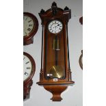 A good Victorian 2 weight walnut Vienna clock