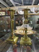 A pair of Victorian brass candlesticks