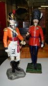 A Grenadier Guards figurine and a Royal Worcester Coldstream Guard field order 1815 figurine