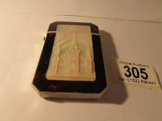 A 19th century mother of pearl card case depicting a church, 9 x 5.