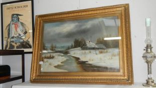 A framed and glazed oil on canvas winter scene initialed W B,