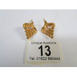 A pair of 18ct gold pendant earrings