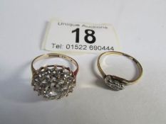 A three stone diamond ring in gold and a gem set cluster ring in 9ct gold