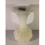 A white milk glass vase.