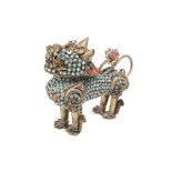 An inlaid brass and metal dog of foo (possibly Tibetan)