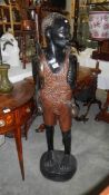 A large carved wood African figure,