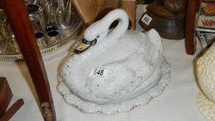 A Victorian Staffordshire cheese dish in the form of a swan