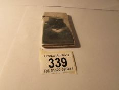 A silver card case, Birmingham 1887, S & H Ltd., 8 x 4.