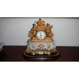 A French alabaster and gilded mantel clock