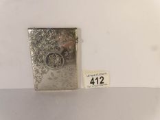 A monogrammed silver card case, Birmingham 1894, H & T, 9 x 6.