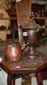 A Victorian copper sauce pan and samovar