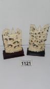 A pair of old ivory wall scenes