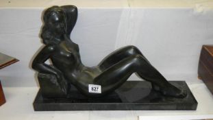 A figure of a reclining nude
