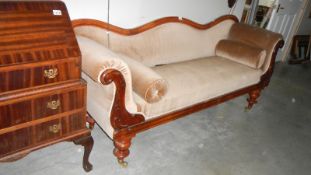 A Victorian double end chaise longue in good order