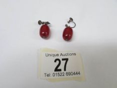 A pair of amber drop earrings