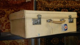 A 1920's pig skin suitcase