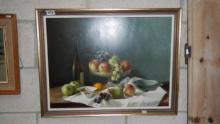 A framed oil on board still life study of fruit signed Eve Scholefield,