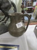 A medieval bronze drinking vessel