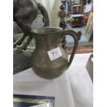 A medieval bronze drinking vessel