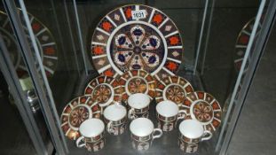 6 Royal Crown Derby coffee cups with saucers and a plate