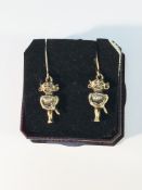 A pair of 9ct gold Lincoln Imp earrings