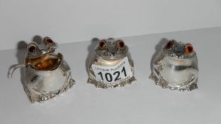 3 silver 'frog' cruets,