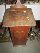 A 19th century oak stick stand