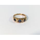 An 18ct gold sapphire and diamond ring,