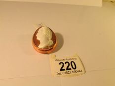 A superb quality 19th century carved shell cameo in an unmarked yellow metal mount and with safety