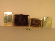 3 card cases and a cigarette case