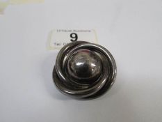 A circa 1940/50's brooch in swirl design,