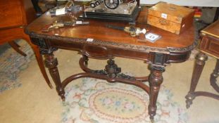 A rosewood centre table in good condition