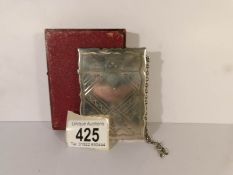 A cased silver card case marked sterling, 9 x 6.