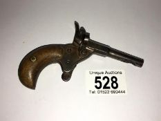 An early garter gun