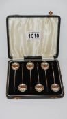 A cased set of 6 silver coffee bean spoons,
