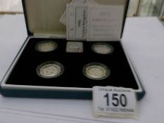 A cased set of 4 silver proof Piedfort £1 coins,