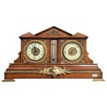 An oak cased clock/barometer