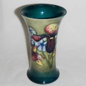 A William Moorcroft 'Slipper Orchid' vase with restoration