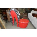A zebra print and red vinyl stiletto heel shoe chair