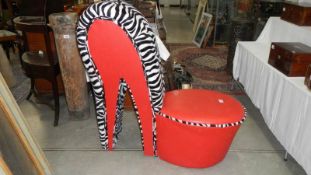 A zebra print and red vinyl stiletto heel shoe chair