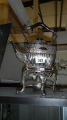 A Victorian silver plated spirit kettle on stand complete with burner