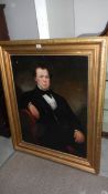 A large gilt framed portrait of a gentleman,