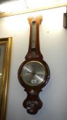 A mother of pearl inlaid barometer with mercury thermometer