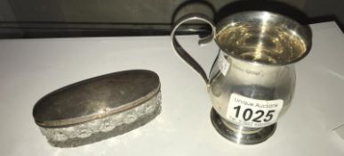 A silver christening cup, Sheffield 1924 and a silver lidded pin pot,
