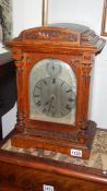 A 3 train oak bracket clock with silver dial