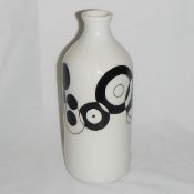 A Moorcroft 'Bottle' trail vase black on ivory ground with firing flaw
