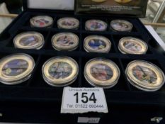 A cased William and Kate engagement commemorative coin collection
