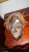 An African Rasta carved wooden mask from Shashemene,